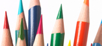 Stacks of pens, pencils and crayons