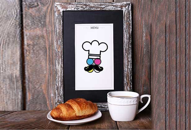 Menu hanging up in a kitchen with a bespoke design